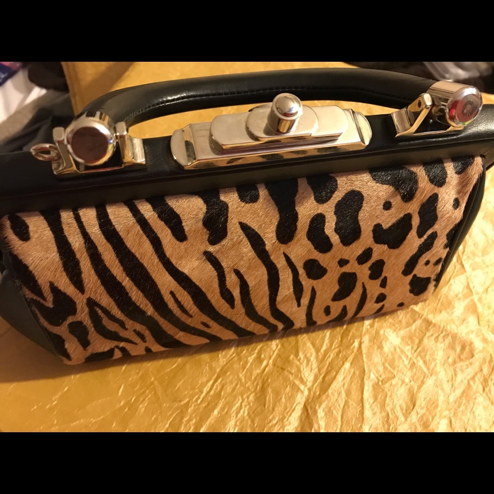 Joan & David Clutch bag